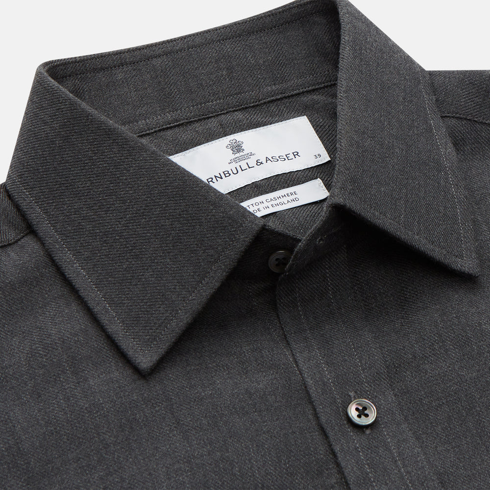 The Turnbull & Asser Charcoal Cotton and Wool Blend Regular Fit Mayfair Shirt features a classic collar, front buttons, and buttoned cuffs—ideal for fans of timeless Mayfair shirts.