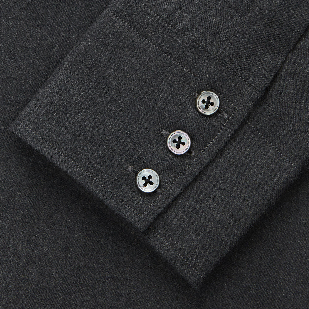 The Turnbull & Asser Charcoal Cotton and Wool Blend Regular Fit Mayfair Shirt features a classic collar, front buttons, and buttoned cuffs—ideal for fans of timeless Mayfair shirts.