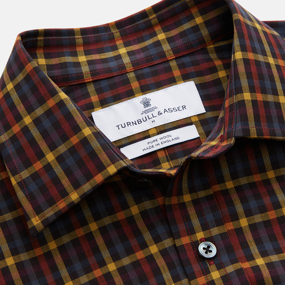 The Turnbull & Asser Blue, Yellow and Red Multi Check Wool Weekend Fit Finch Shirt is a men's long-sleeve button-up with a pointed collar and chest pocket, displayed on a plain white background.