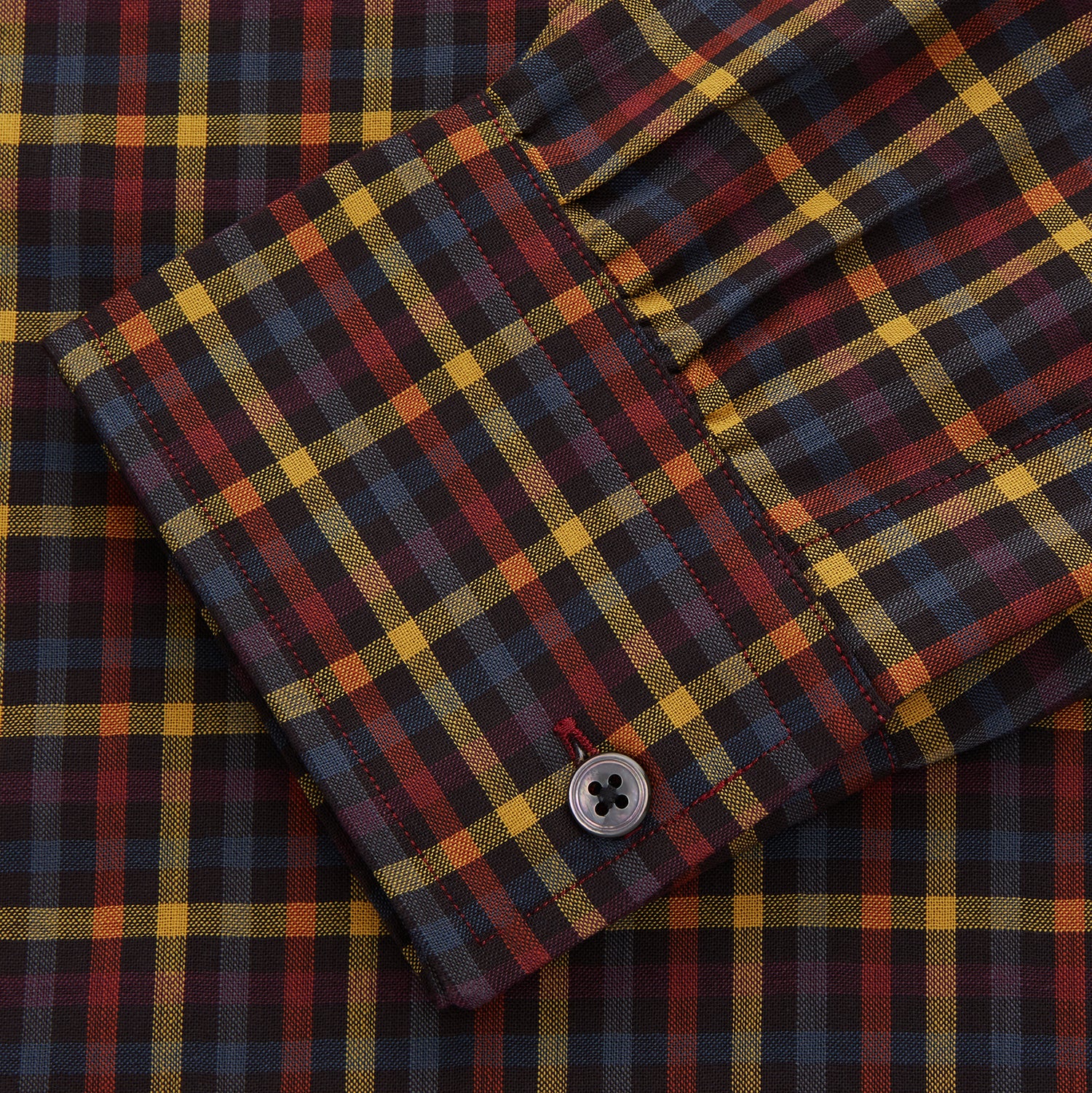 View 2 of product The Turnbull & Asser Blue, Yellow and Red Multi Check Wool Weekend Fit Finch Shirt is a men's long-sleeve button-up with a pointed collar and chest pocket, displayed on a plain white background.