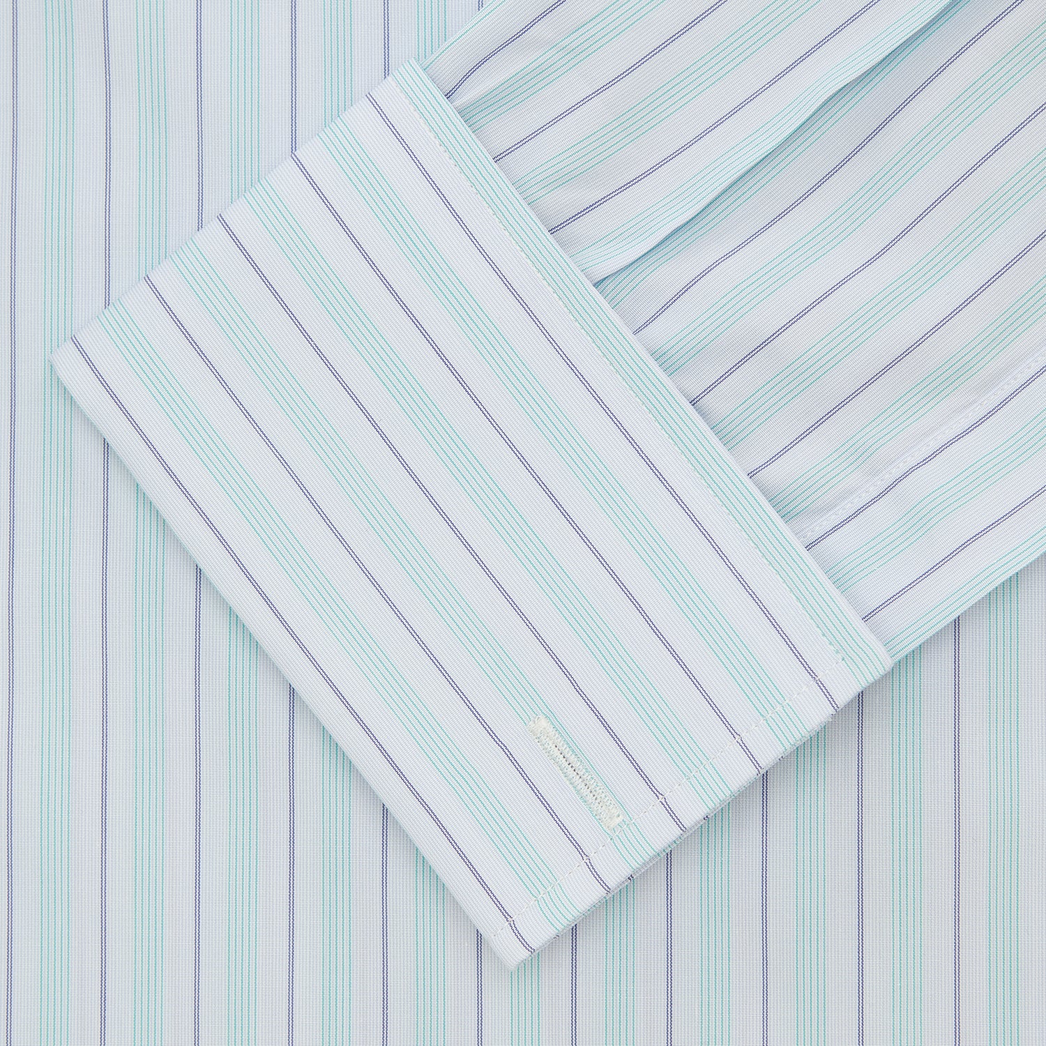 View 2 of product The Turnbull & Asser Green & Light Blue Stripe Poplin Cotton Shirt features a regular fit, T&A collar, and 2-button cuff. Its crisp vertical stripes in green and light blue stand out against a plain white background.