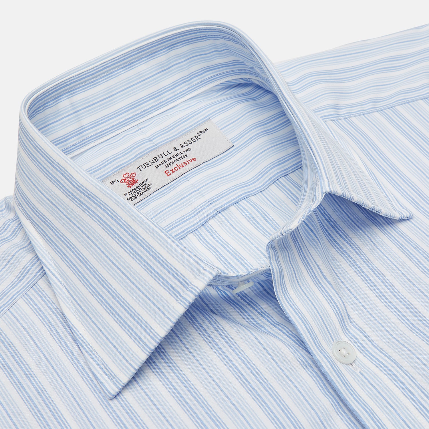 View 3 of product The Turnbull & Asser Blue & White Stripe Poplin Cotton Regular Fit Shirt features a T&A collar, double cuffs, and vertical stripes, showcased against a plain white background.