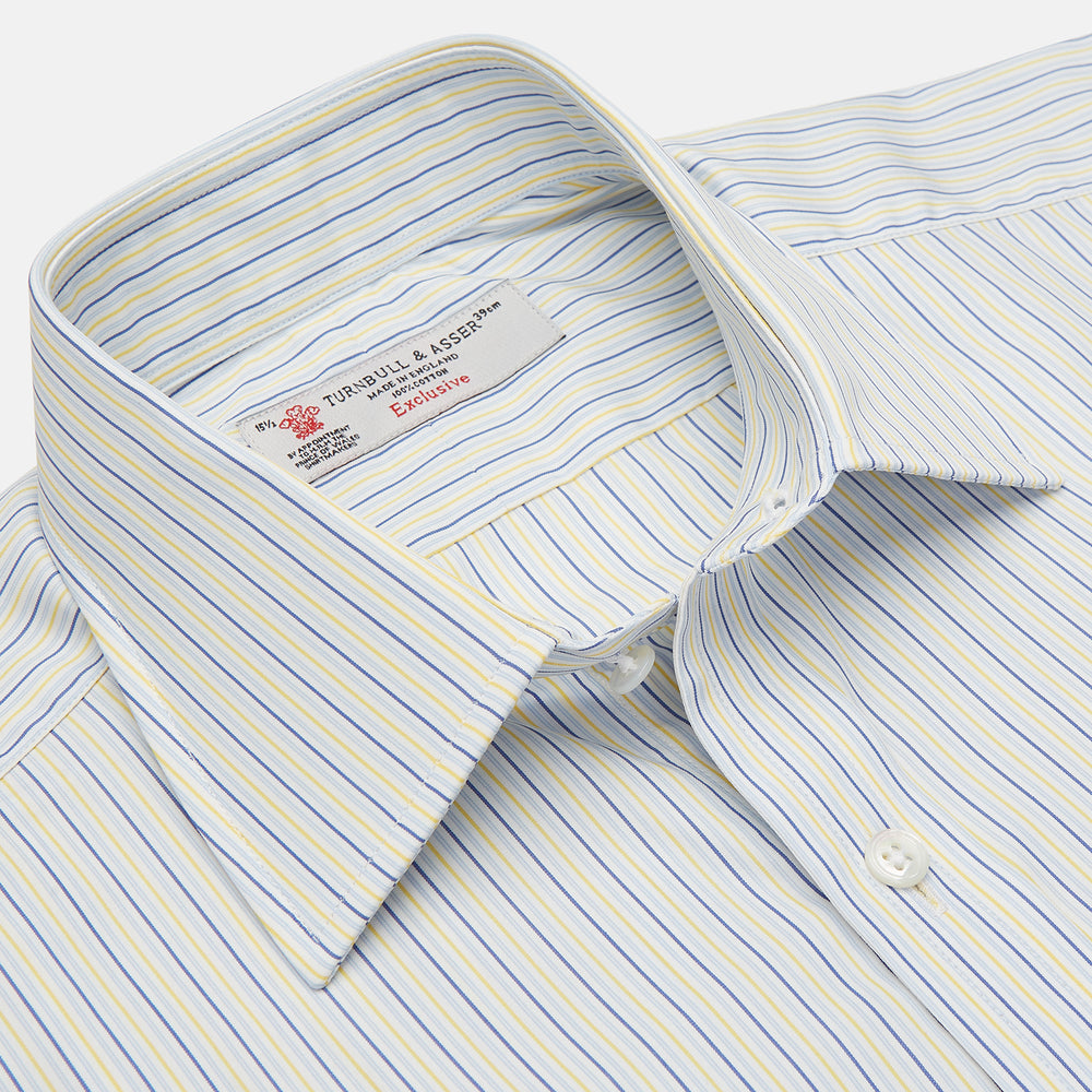 The Turnbull & Asser Yellow and Navy Small Stripe Shirt features a T&A collar, 3-button cuffs, and vertical stripes, laid flat on a white background.