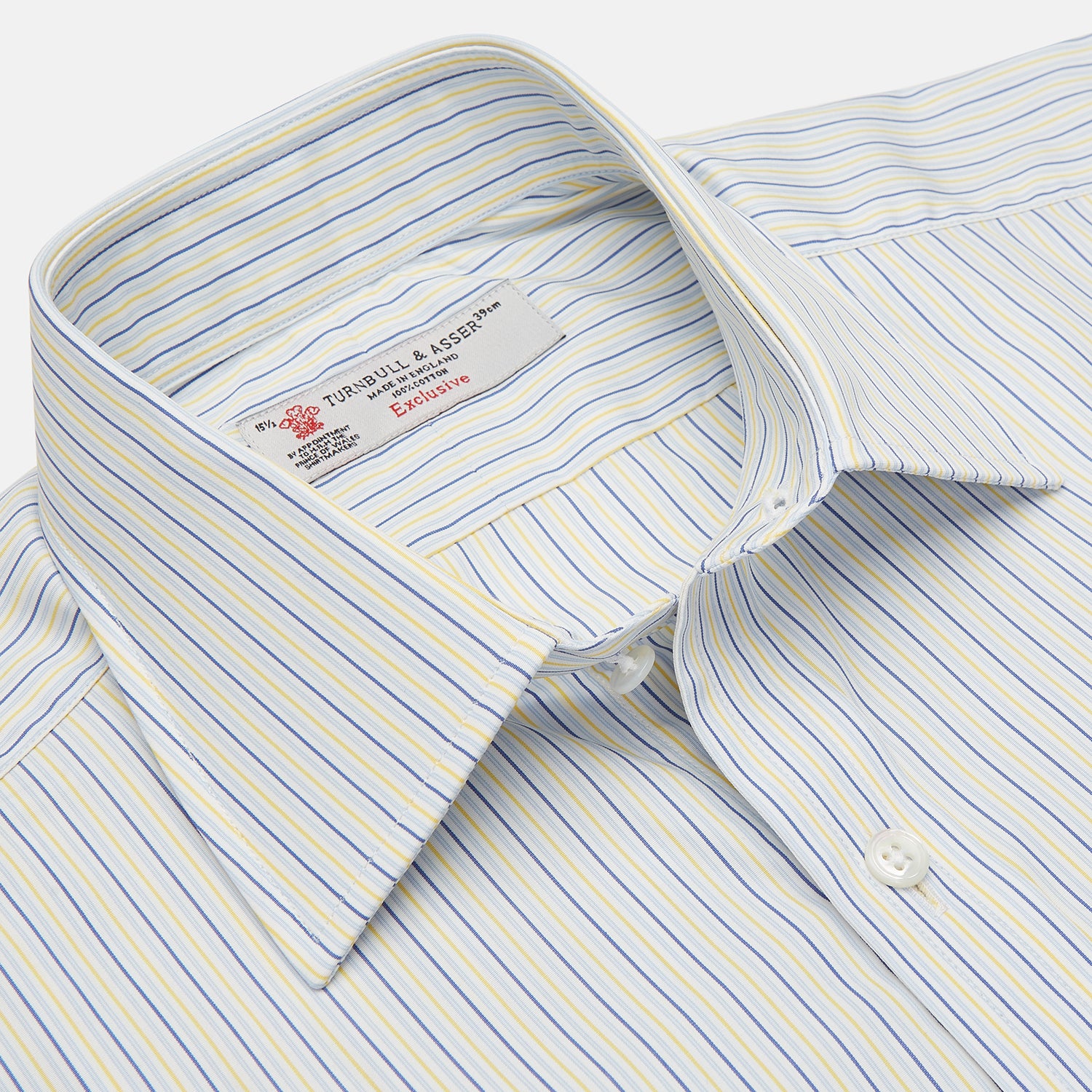 View 3 of product The Turnbull & Asser Yellow and Navy Small Stripe Shirt features a T&A collar, 3-button cuffs, and vertical stripes, laid flat on a white background.