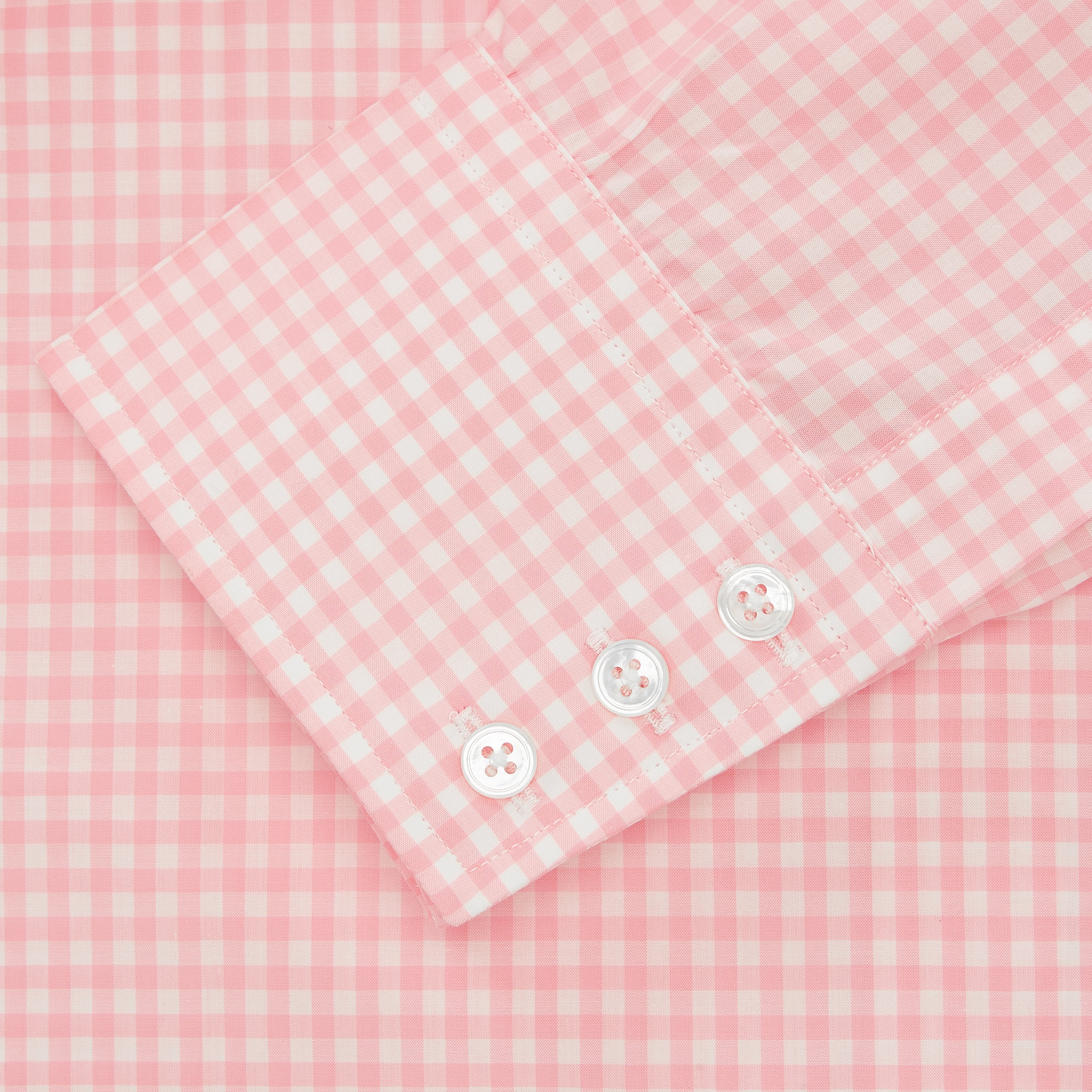 View 3 of product The Pink & White Cotton Gingham Check Shirt with T&A Collar and 3-button cuffs by Turnbull & Asser is shown on a white background—style it with Turnbull chinos for a timeless classic look.