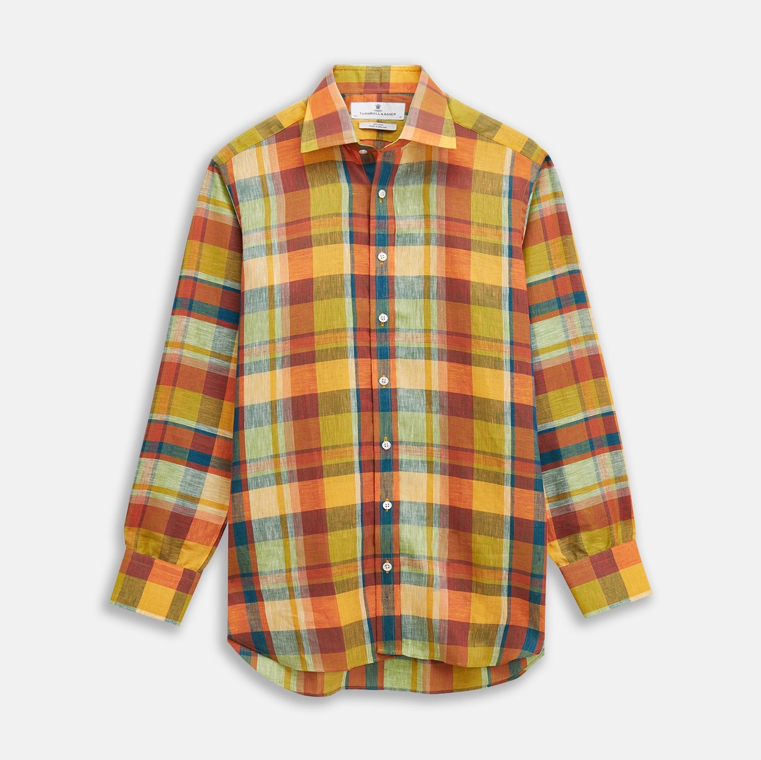 View 2 of product A close-up of Turnbull & Asser’s Orange Madras Check Linen Fabric, showing a vibrant plaid with intersecting red, green, yellow, blue, and orange stripes in a circular frame on a white background.