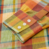 View 3 of product The Turnbull & Asser Orange Madras Check Regular Fit Linen Shirt features a T&A collar, 3-button cuffs, and a vibrant multicolor plaid pattern, shown on a white background.