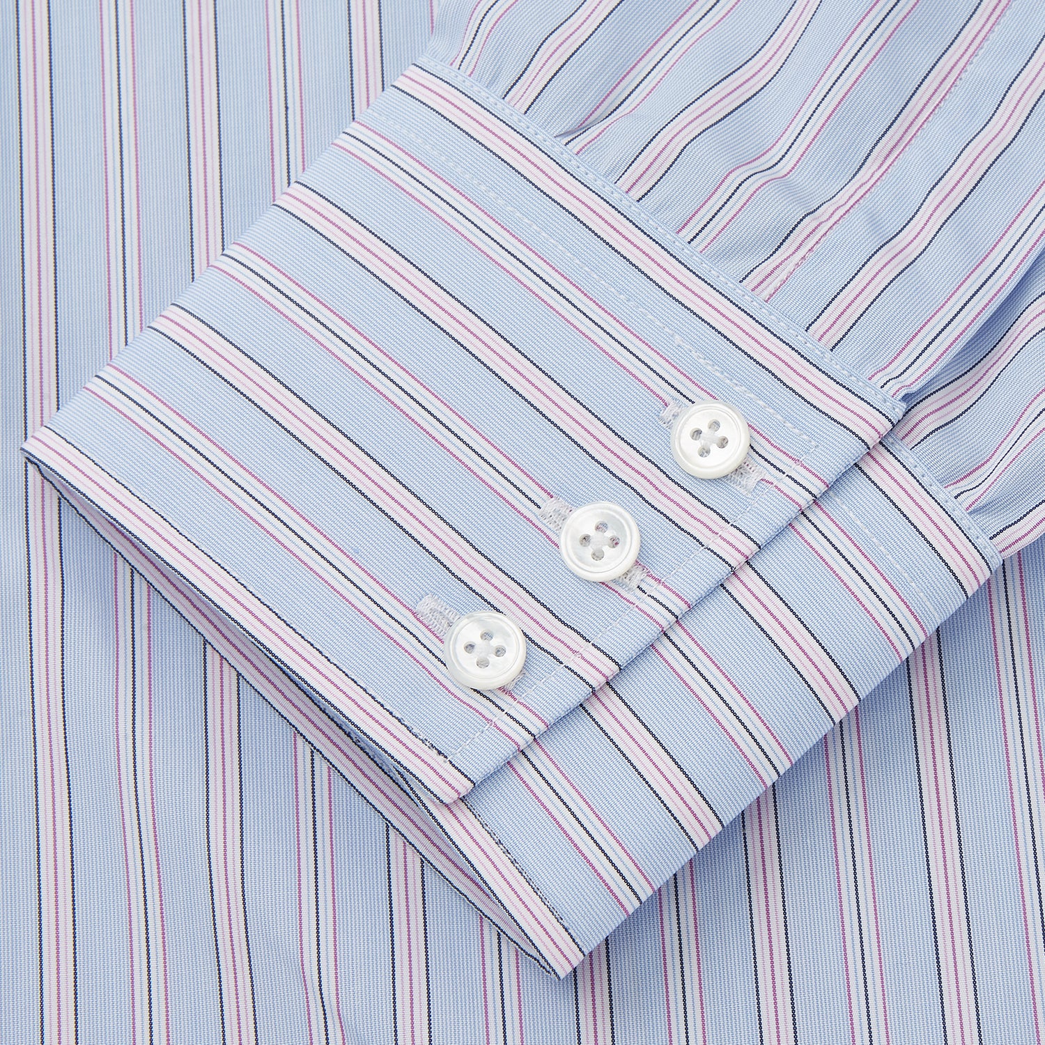 View 3 of product The Turnbull & Asser Blue and Pink Stripe Poplin Cotton Regular Fit Shirt features a T&A collar, 3-button cuffs, and vertical stripes, presented against a plain white background.