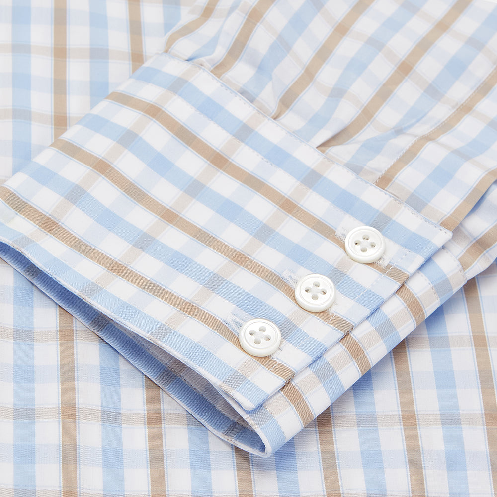 The Turnbull & Asser Blue and Brown Check Poplin Shirt features a T&A collar, 3-button cuffs, and a regular fit cotton construction, shown laid flat against a white background.