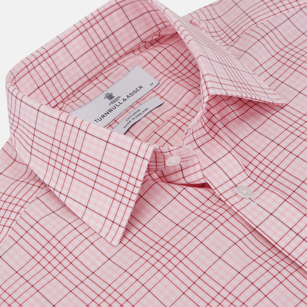 The Turnbull & Asser Pink Fine Check Shirt features superfine cotton Zephir, a T&A collar, and three-button cuffs, shown laid flat on a white background.