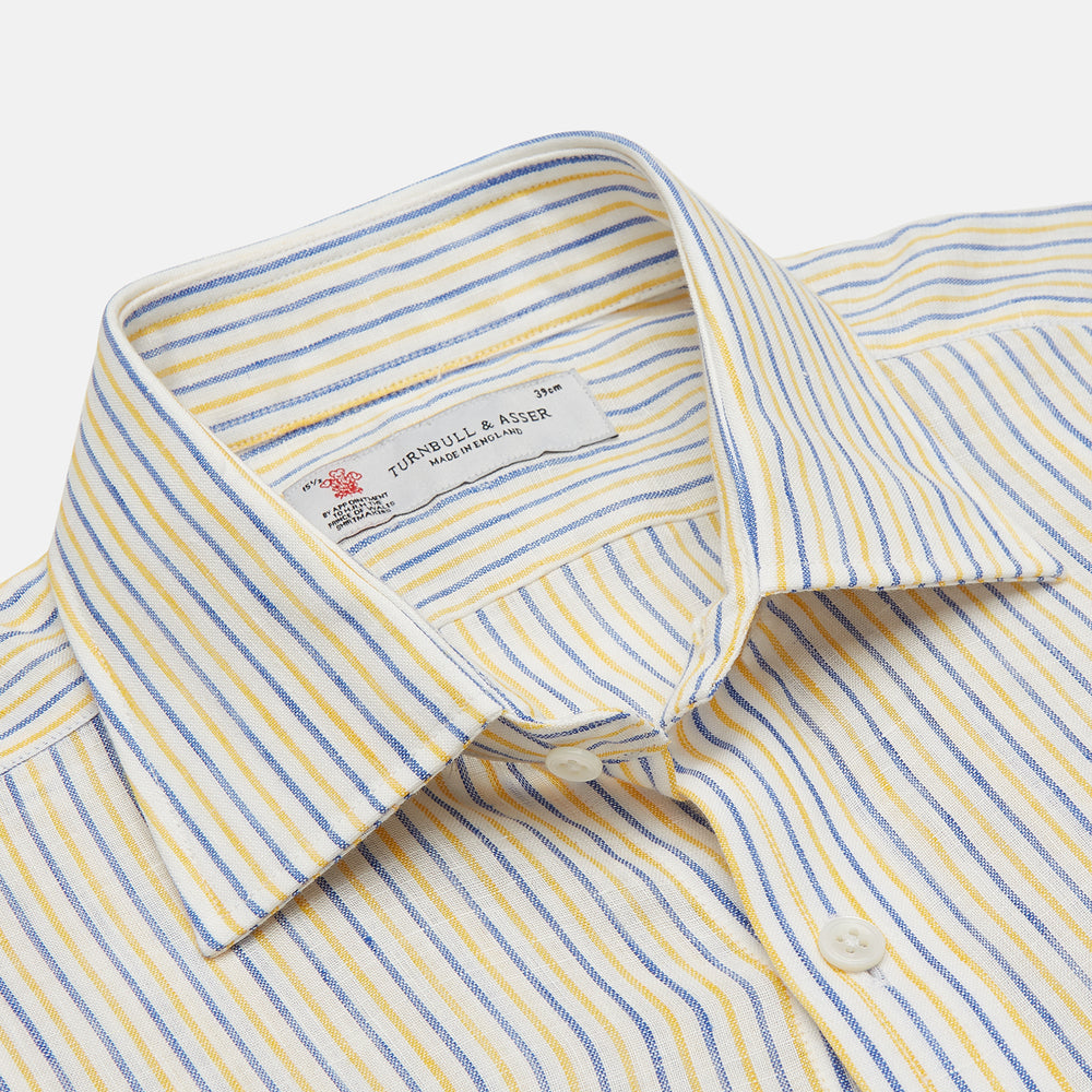 Turnbull & Asser's Yellow and Blue Ticking Stripe Linen Shirt features a POW collar and 3-button cuffs, displayed on a plain light gray background.