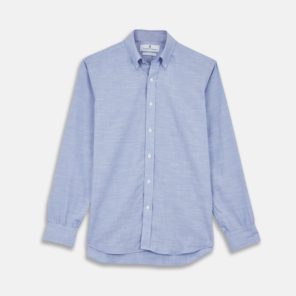 The Turnbull & Asser Blue Chambray Weekend Fit Shirt features a Dorset collar, 1-button cuffs, and white buttons, shown flat on a white background.