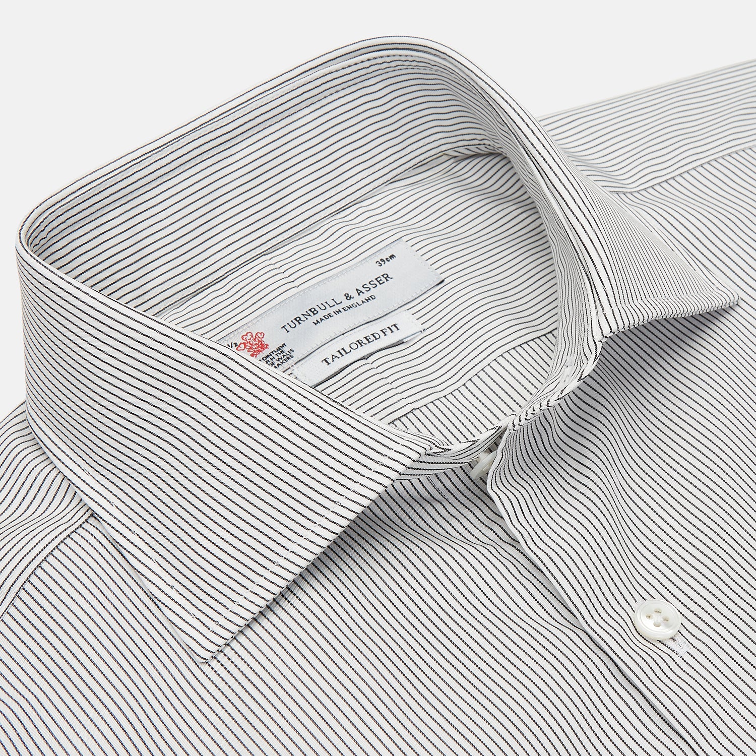 View 3 of product Turnbull & Asser's Tailored Fit Grey and White Pinstripe Shirt features a Kent collar, 2-button cuffs, and white buttons. Displayed on a plain white background.