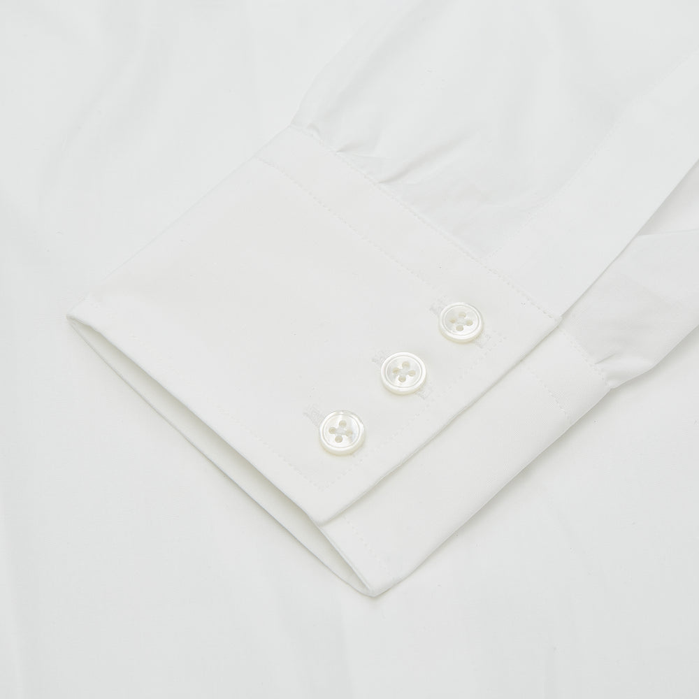 The Turnbull & Asser Plain White Regular Fit Cotton Shirt features a round collar and 3-button cuffs, showcased against a white background.