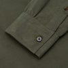 View 3 of product The Turnbull & Asser Khaki Corduroy Officer Weekend Fit Shirt features a Dorset collar, one-button cuffs, and two chest pockets with buttoned flaps, shown laid flat on a white background.