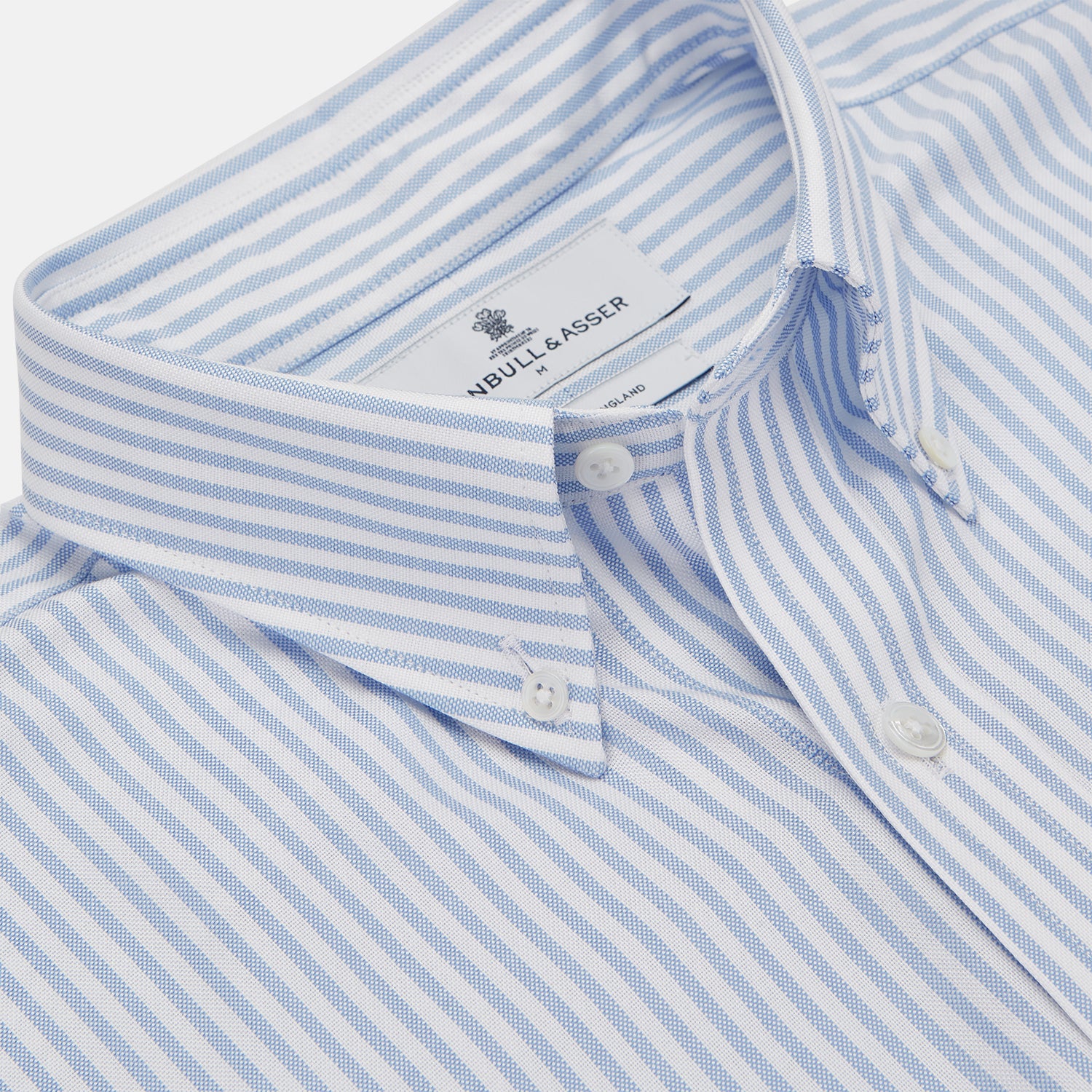 View 2 of product The Turnbull & Asser Blue and White Fine Stripe Oxford Weekend Fit Shirt features a Dorset collar and 1-button cuffs, shown laid flat on a white background. Part of our Weekend Fit shirts collection.