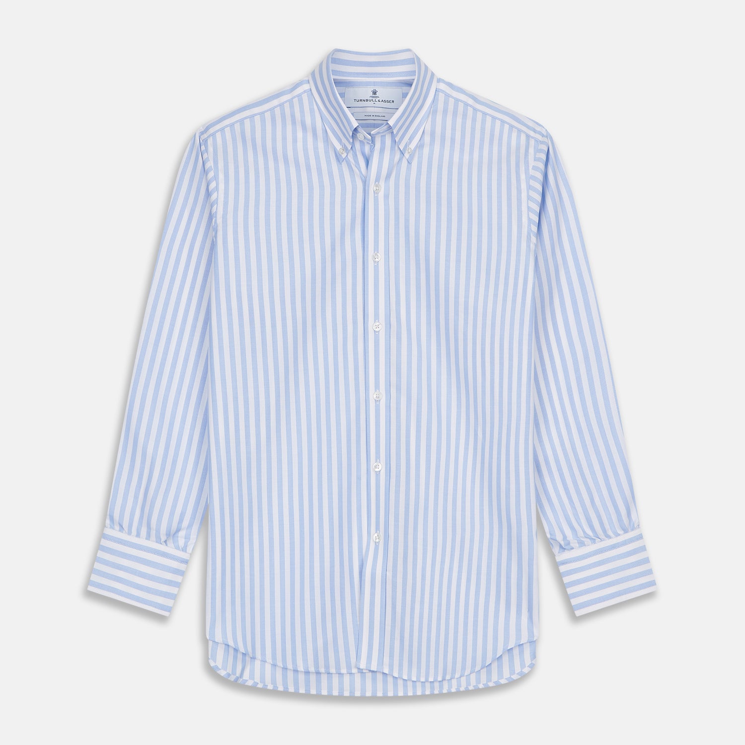 View 1 of product The Turnbull & Asser Blue and White Bengal Stripe Oxford Weekend Fit Shirt features a Dorset collar and 1-button cuffs, shown laid flat on a white background.