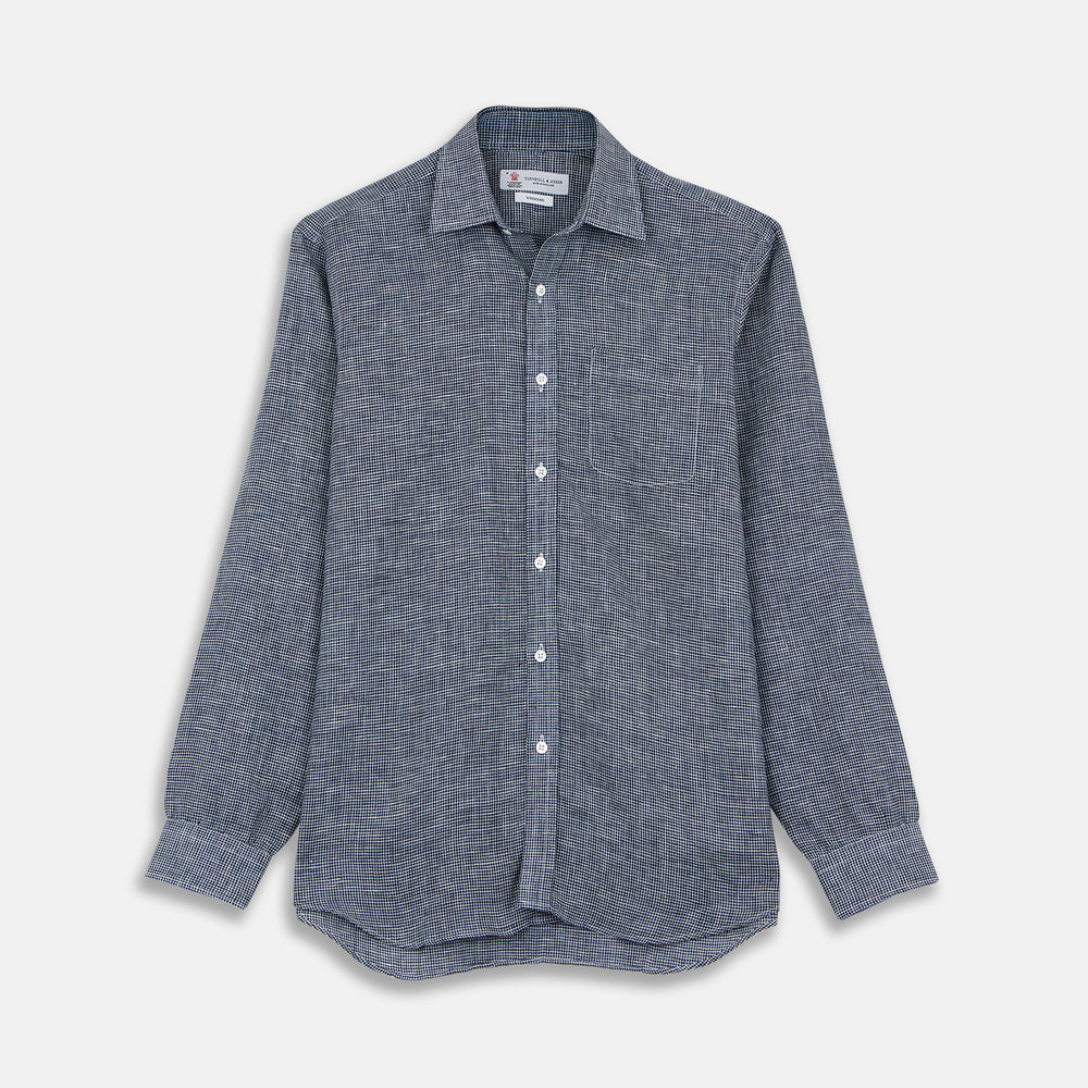 The Turnbull & Asser Weekend Fit Navy Check Linen Shirt features a Derby collar, left chest pocket, 1-button cuffs, and white buttons in textured microcheck fabric, shown laid flat on a white background.