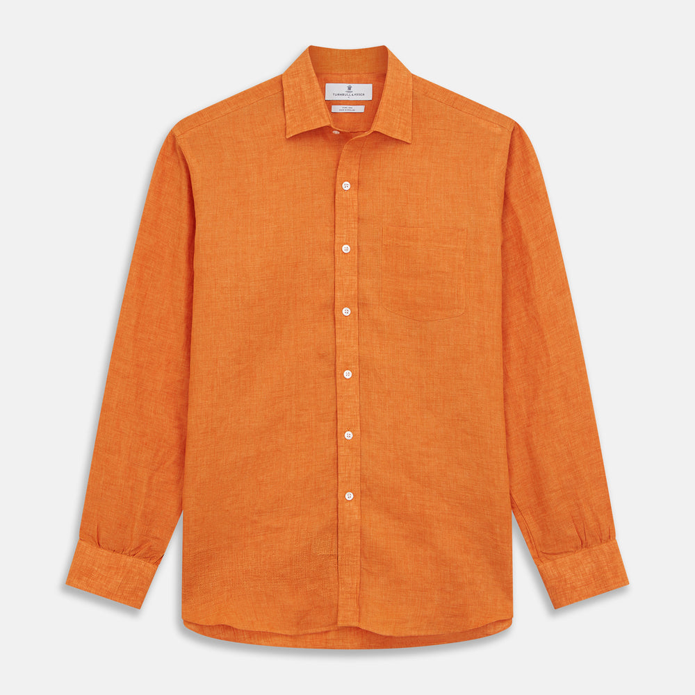 The Turnbull & Asser Orange Weekend Fit Linen Nevis Shirt features a Derby collar, long sleeves with 1-button cuffs, white buttons, and a chest pocket, shown flat against a white background.