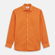 The Turnbull & Asser Orange Weekend Fit Linen Nevis Shirt features a Derby collar, long sleeves with 1-button cuffs, white buttons, and a chest pocket, shown flat against a white background.