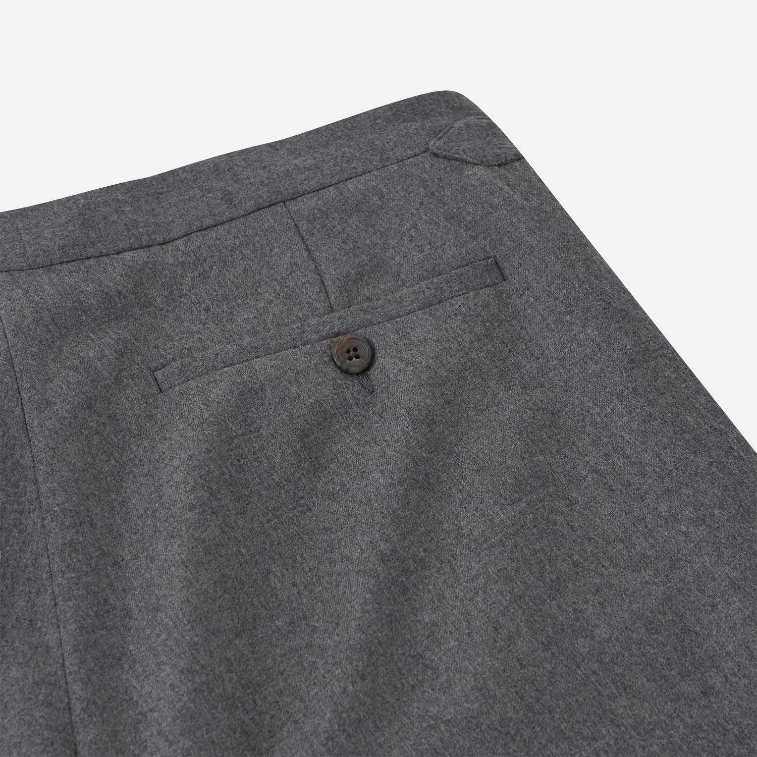 View 3 of product The Grey Fox Flannel Trousers by Turnbull & Asser are tailored in a straight-leg fit from soft wool flannel by Fox Brothers, featuring belt loops and side pockets, shown flat on a white background.
