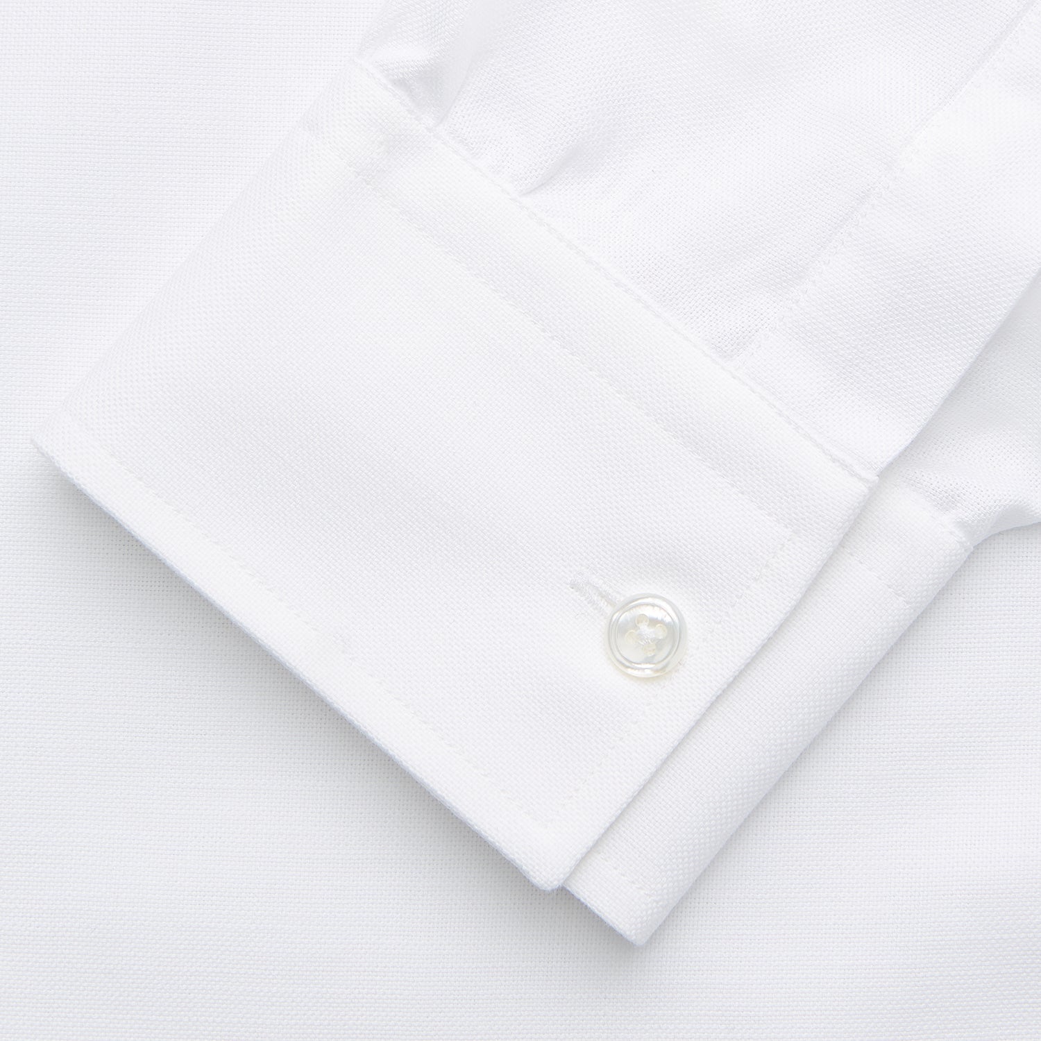 View 3 of product The Turnbull & Asser White Chambray Weekend Fit Shirt features a Dorset collar, 1-button cuffs, and a front pocket. Its clean design stands out against a plain white background—perfect for fans of classic Weekend Fit shirts.
