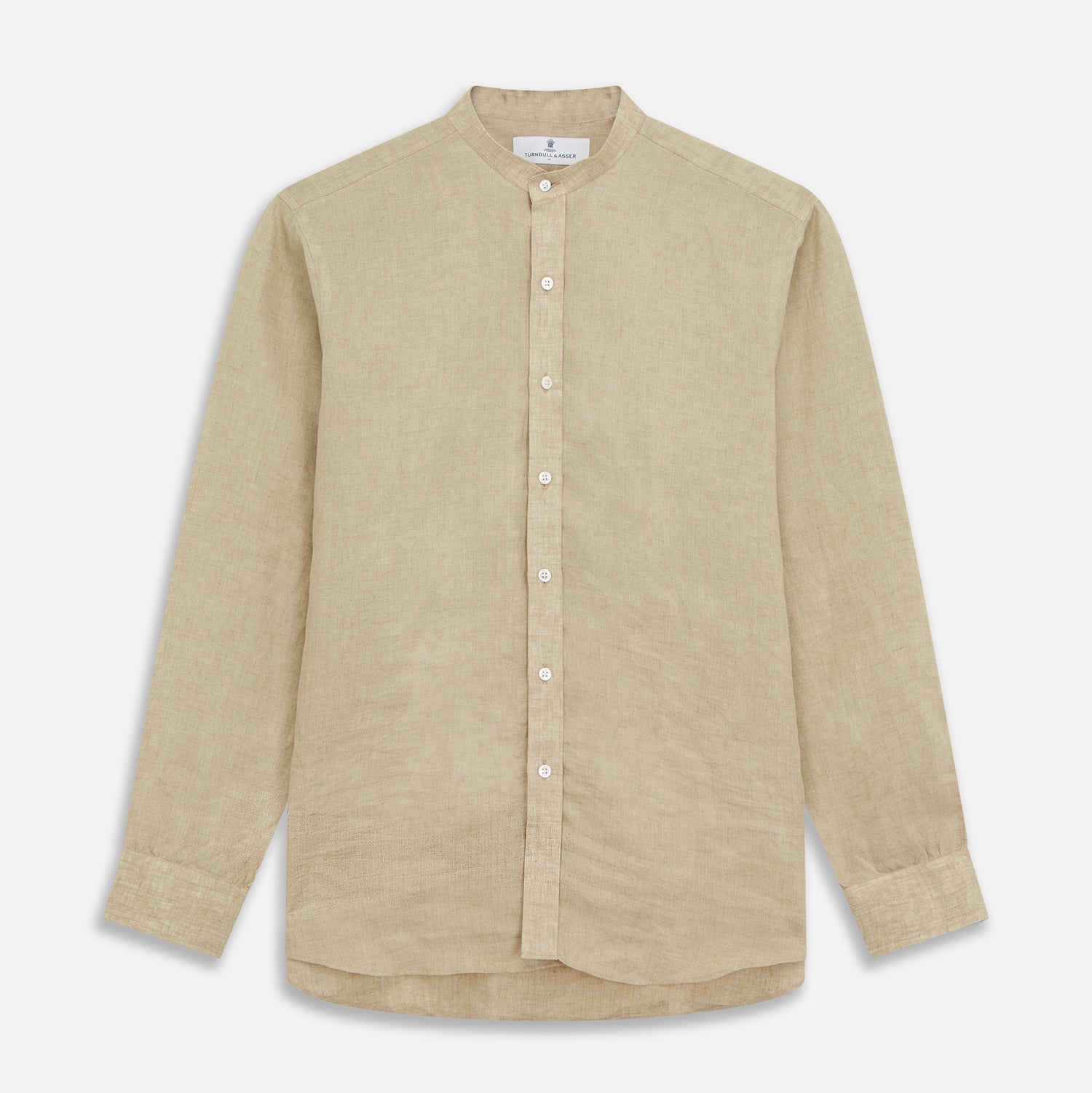View 3 of product A man with a bald head and trimmed beard wears the Turnbull & Asser Beige Weekend Fit Linen Blake Shirt with stand collar and 1-button cuffs, standing calmly against a matching beige background.