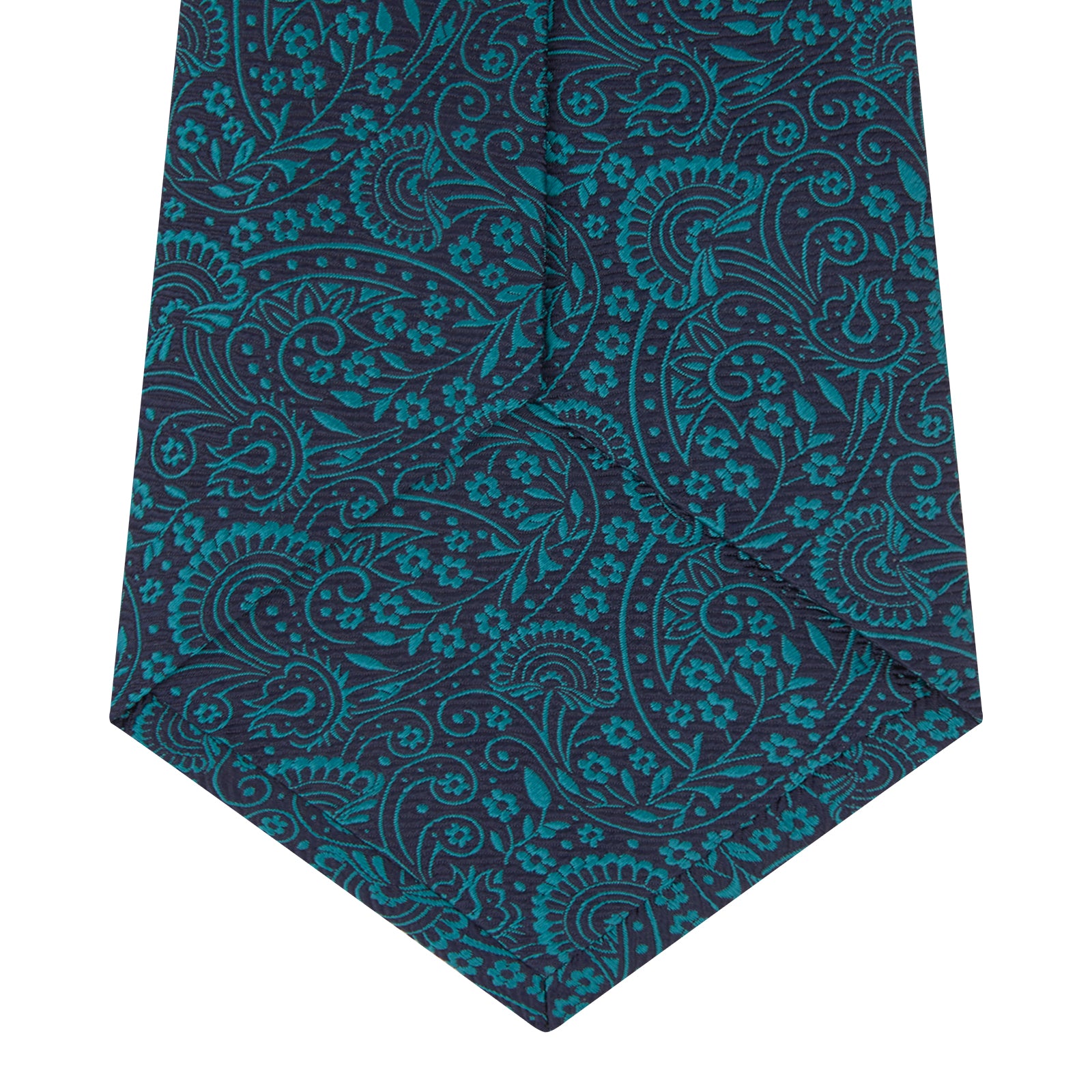 View 3 of product The Turnbull & Asser Green and Navy Tonal Paisley Silk Tie is an elegant men's accessory, featuring a rolled-up design with an intricate paisley pattern, shown on a white background.