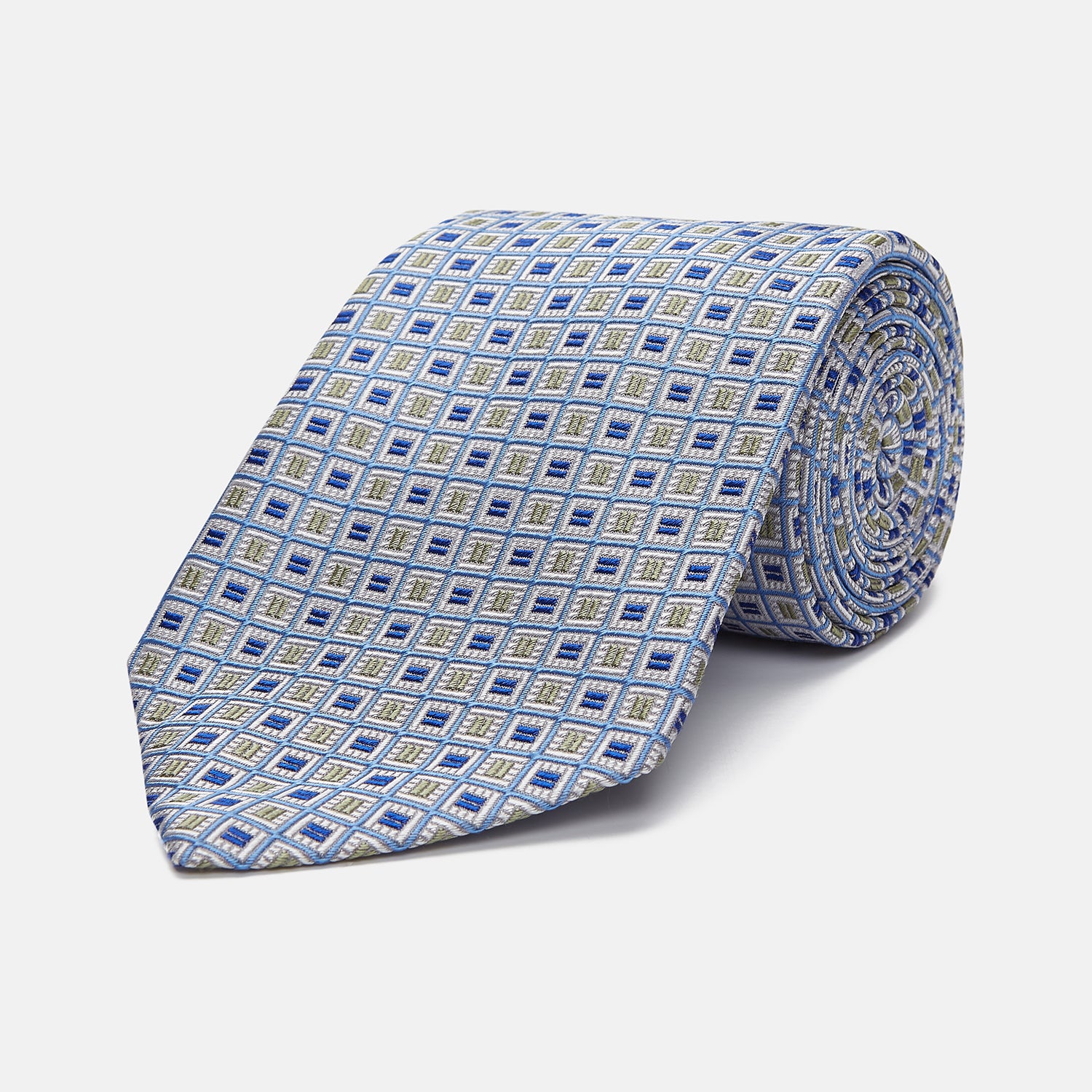 View 1 of product A Turnbull & Asser Blue and Yellow Geometric Silk Jacquard Tie is shown rolled up on a plain light background.