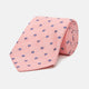 The Turnbull & Asser Pink Fine Square Slub Silk Tie features a pastel pink silk jacquard with blue and white geometric squares, shown rolled up on a plain white background.
