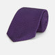 The Turnbull & Asser Purple Abstract Tonal Silk Jacquard Tie, featuring a textured geometric pattern, is shown rolled up against a white background—an ideal choice to elevate any formal outfit.
