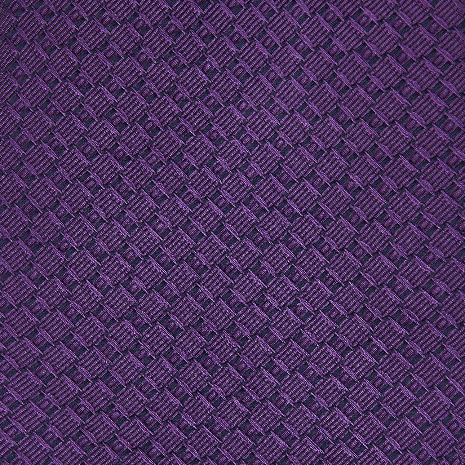 View 3 of product The Turnbull & Asser Purple Abstract Tonal Silk Jacquard Tie, featuring a textured geometric pattern, is shown rolled up against a white background—an ideal choice to elevate any formal outfit.