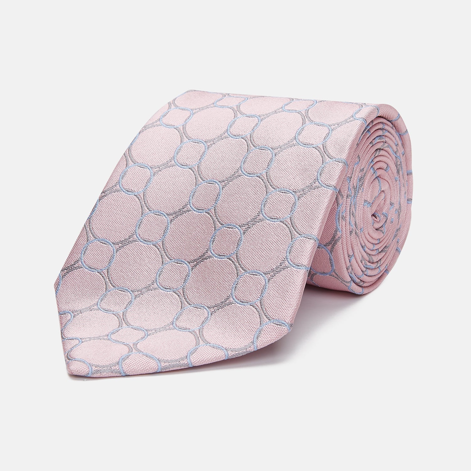 View 1 of product The Turnbull & Asser Baby Pink and Blue Circle Jacquard Silk Tie features a subtle geometric pattern, elegantly rolled against a plain white background.
