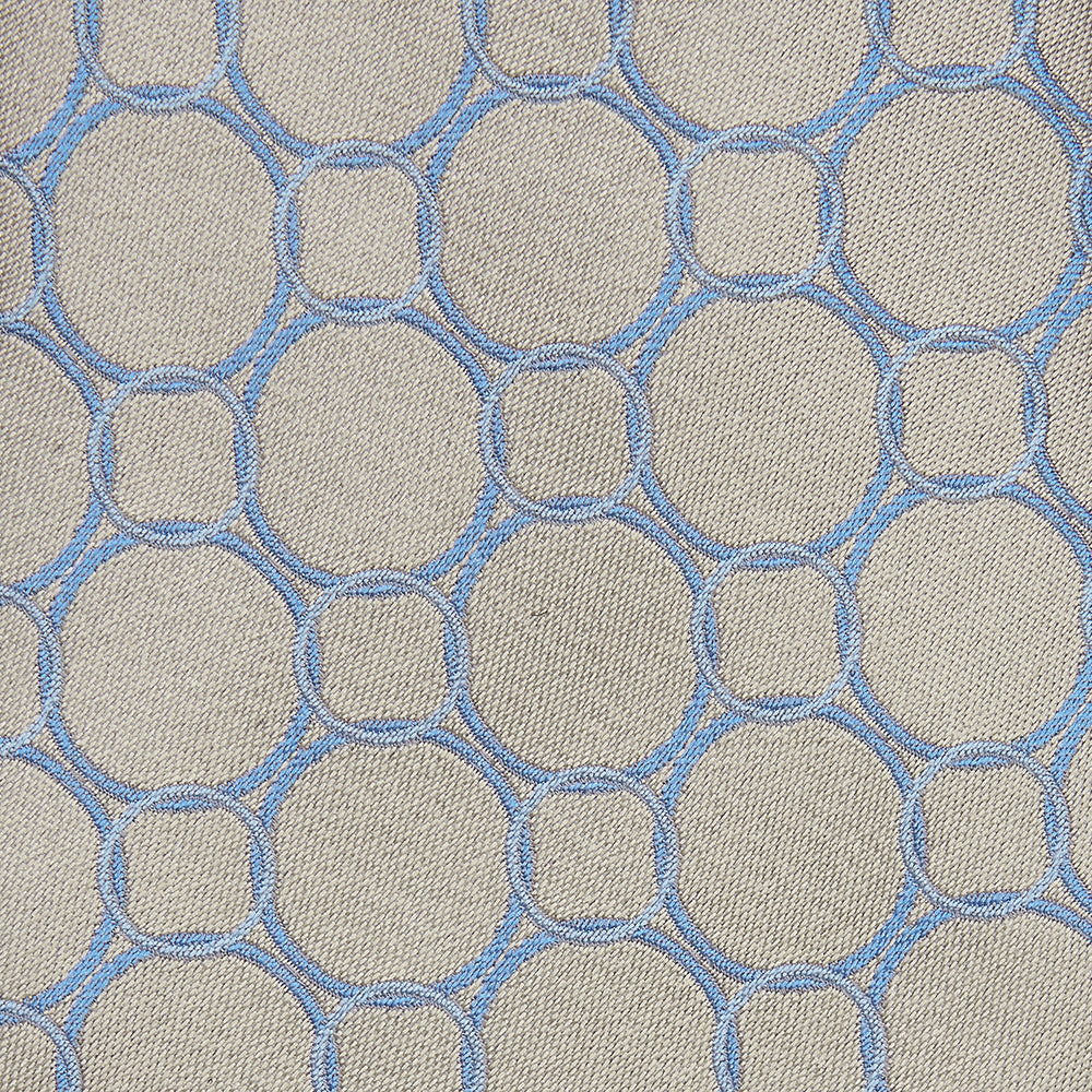 The Turnbull & Asser Toffee and Powder Blue Circle Jacquard Silk Tie, featuring an interlocking circular pattern, is rolled up and displayed on a plain white background.