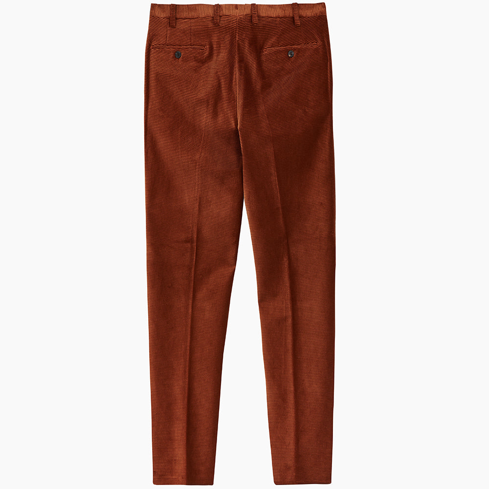 Turnbull & Asser’s Rust Horizontal Cord Trousers feature a straight-leg cut, front pockets, and button closure. Made from heavy-weight corduroy, these trousers are shown laid flat on a white background.