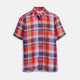 The Turnbull & Asser Red Madras Check Weekend Fit Short Sleeve Linen Shirt features a Dorset collar, white buttons, and a red, blue, white, and beige plaid pattern. Shown on a plain white background.