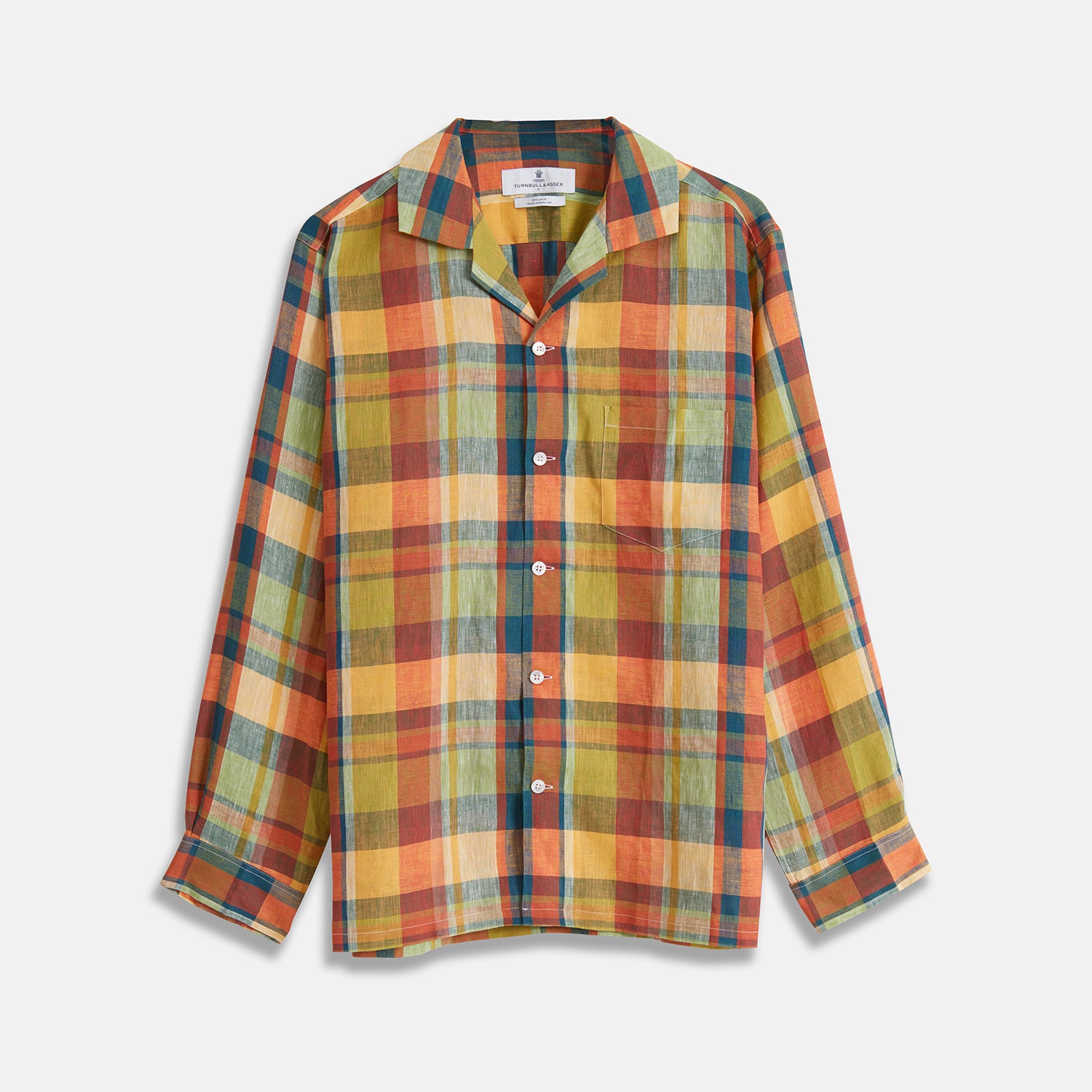 View 1 of product Turnbull & Asser's Orange Madras Check Holiday Fit Long Sleeve Linen Shirt features a bold plaid in orange, yellow, green, and blue with a revere collar and 1-button cuff—ideal for effortless holiday style. Laid flat on white background.