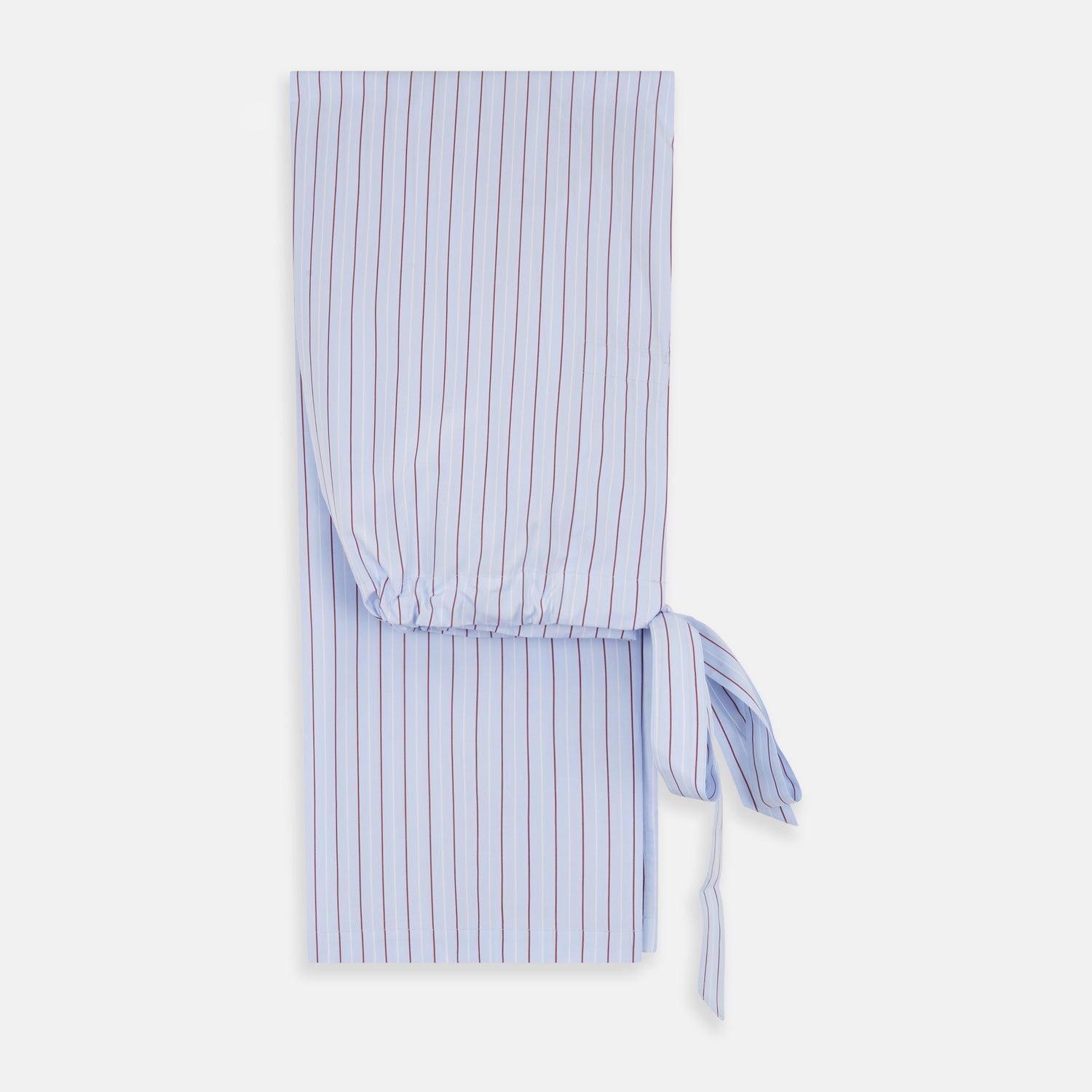 View 7 of product The Turnbull & Asser Burgundy Stripe Classic Pyjama Set features long sleeves, a button-up top with red piping, matching drawstring pants, and a traditional fit. Laid flat, it's luxury loungewear in signature burgundy stripes.