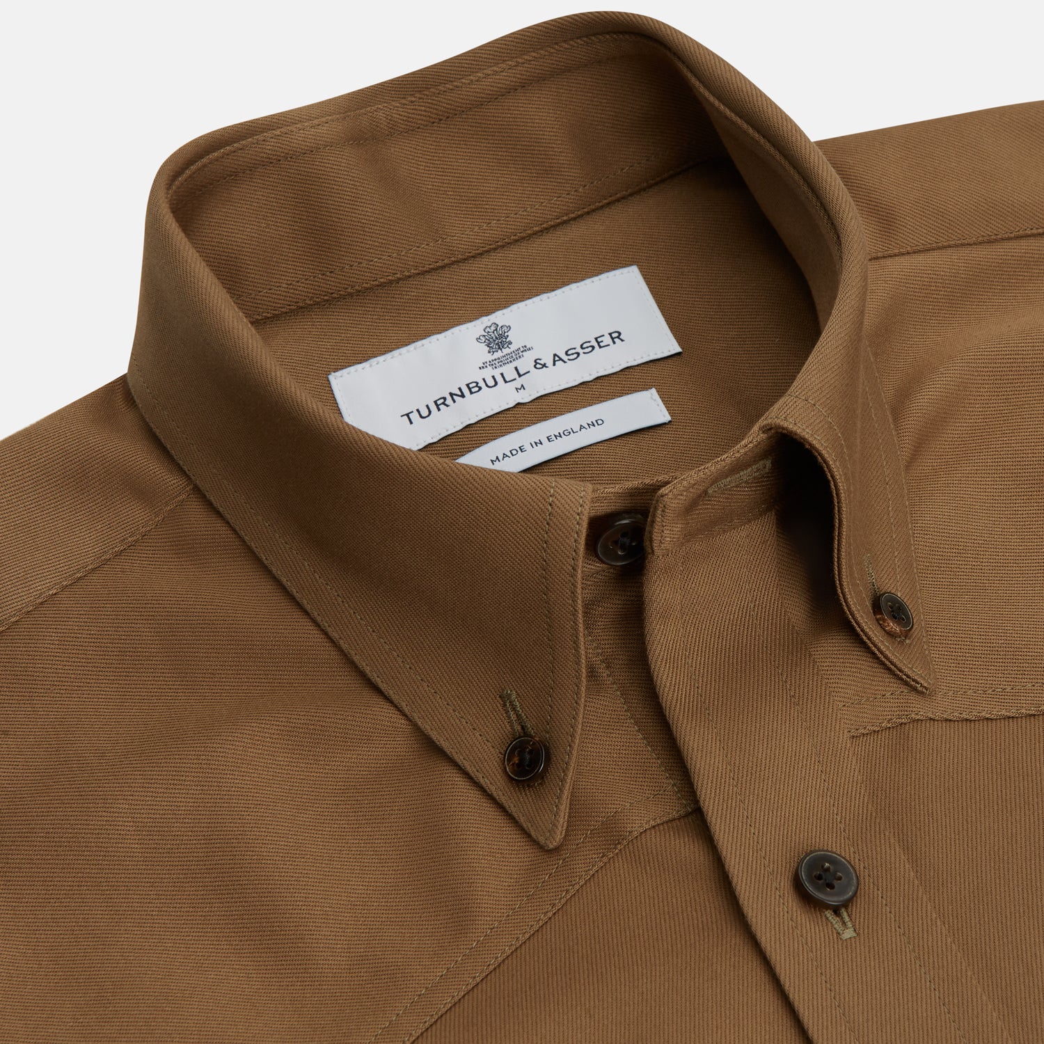 View 2 of product The Turnbull & Asser Khaki Cotton Weekend Fit Western Shirt features a Dorset collar, long sleeves, two button-flap chest pockets, and buttoned cuffs—an essential smart-casual piece shown against a white background.