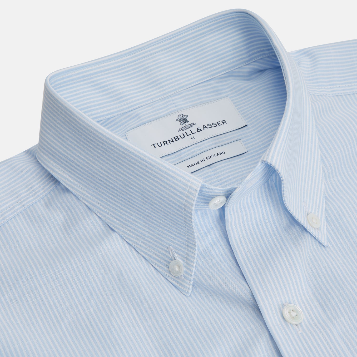 View 2 of product The Turnbull & Asser Sky Blue Chambray Stripe Weekend Fit Shirt features a Dorset collar, long sleeves, and two button-flap chest pockets, offering a relaxed look. Displayed on a plain white background.