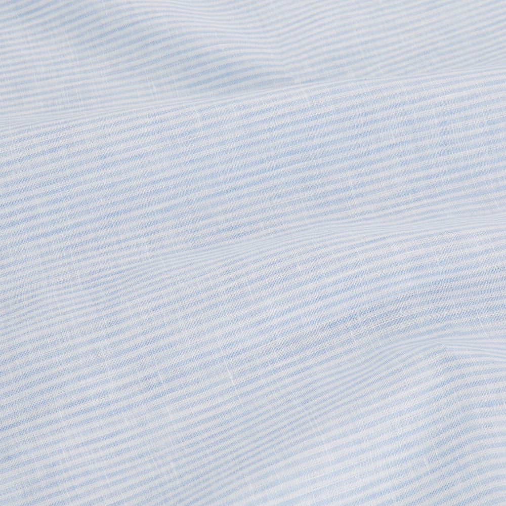The Turnbull & Asser Blue Linen Stripe Holiday Fit Shirt features short sleeves, a revere collar, and single chest pocket, perfect for resort wear. Shown on a plain white background.