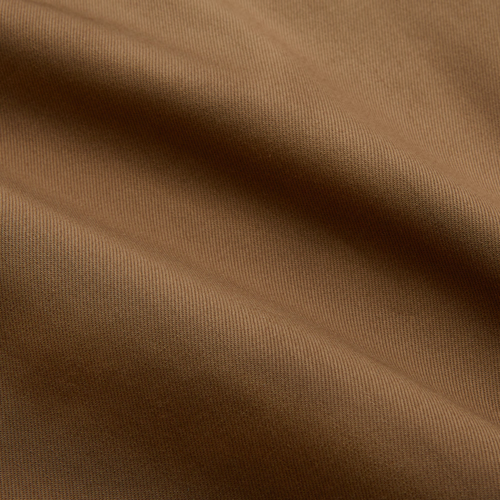 The Turnbull & Asser Khaki Cotton Weekend Fit Western Shirt features a Dorset collar, long sleeves, two button-flap chest pockets, and buttoned cuffs—an essential smart-casual piece shown against a white background.