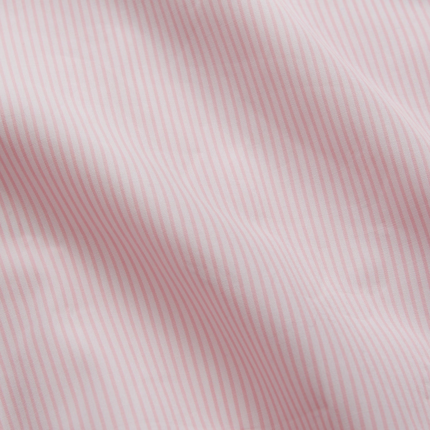 View 5 of product The Pink Fine Stripe Regular Fit Shirt with T&A Collar by Turnbull & Asser is a light pink, long-sleeve poplin shirt made from Italian cotton, featuring white buttons and shown flat on a white background.
