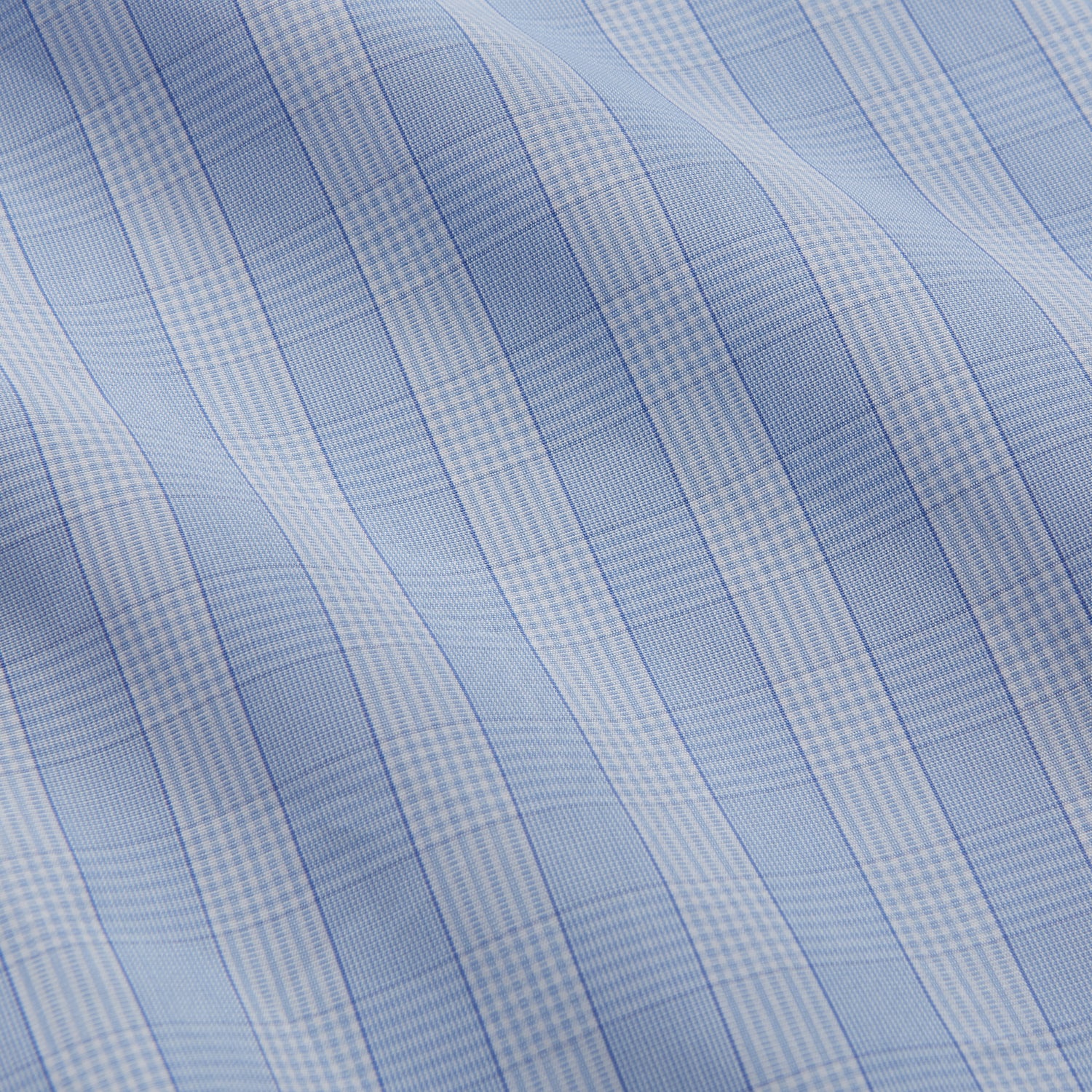 View 4 of product The Tonal Blue Glen Check Tailored Fit Shirt by Turnbull & Asser features a Kent collar and white buttons, crafted from fine Italian cotton poplin for a refined look. Displayed flat on a white background.
