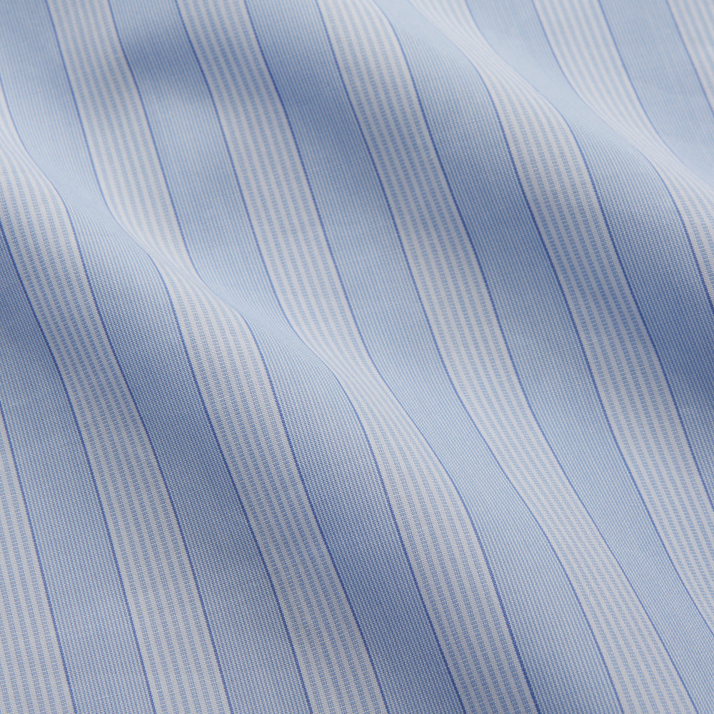 The Turnbull & Asser Tonal Blue Stripe Tailored Fit Shirt with Kent Collar features long sleeves and a button-up front, shown laid flat against a white background.