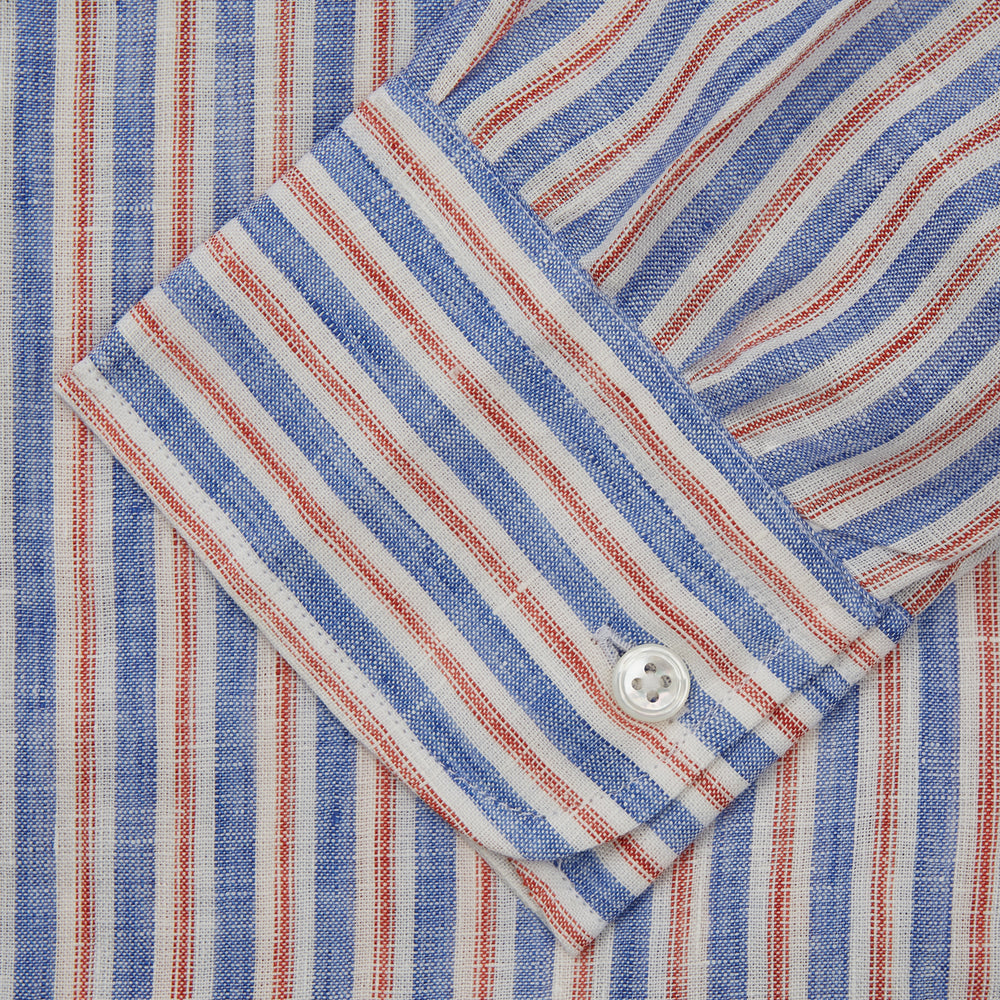 The Turnbull & Asser Blue & Red Linen Stripe Weekend Fit Shirt features a stand collar, vertical stripes, and two chest pockets with button flaps—perfect for casual style.