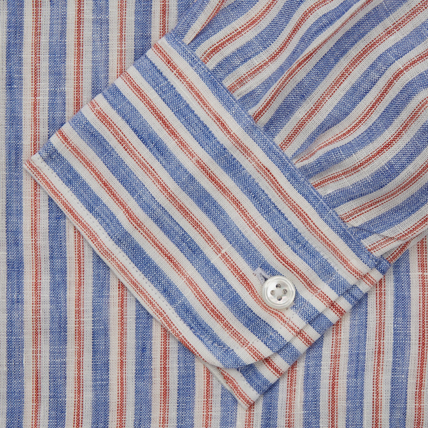 View 3 of product The Turnbull & Asser Blue & Red Linen Stripe Weekend Fit Shirt features a stand collar, vertical stripes, and two chest pockets with button flaps—perfect for casual style.