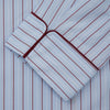 View 3 of product The Turnbull & Asser Burgundy Stripe Classic Pyjama Set features long sleeves, a button-up top with red piping, matching drawstring pants, and a traditional fit. Laid flat, it's luxury loungewear in signature burgundy stripes.