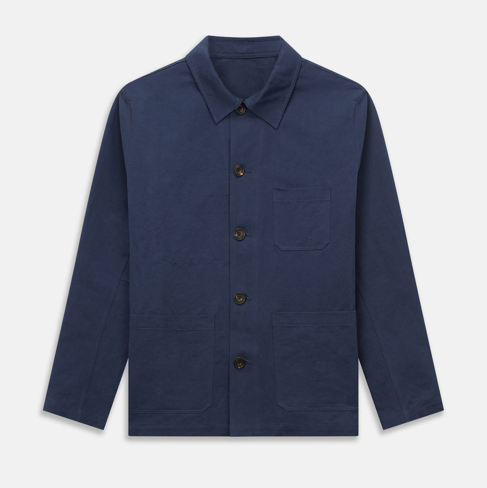 The Turnbull & Asser Navy Cotton-Linen Remy Chore Jacket features a collar, long sleeves, button closure, and three front pockets—a versatile minimalist essential for any men's wardrobe, shown laid flat on a white background.