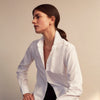 View 9 of product The Turnbull and The Deck White Cotton Traditionalist Shirt by Turnbull & Asser features a classic collar, buttoned front and cuffs, and a refined Royal Oxford weave, shown on a plain light gray background.